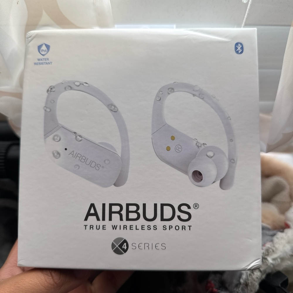 Brand new white Airbuds sports headphones